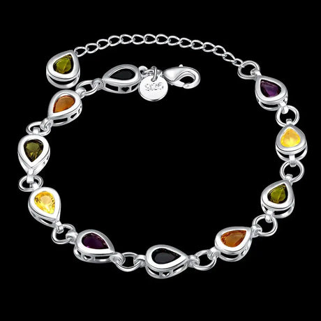 Silver bracelet with teardrop-shaped gemstones on a black background