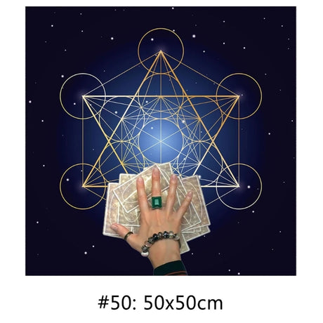 Hand holding tarot cards with a geometric star design against a starry night sky.