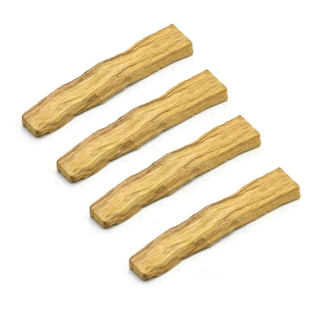Four pieces of light brown wood on a white background