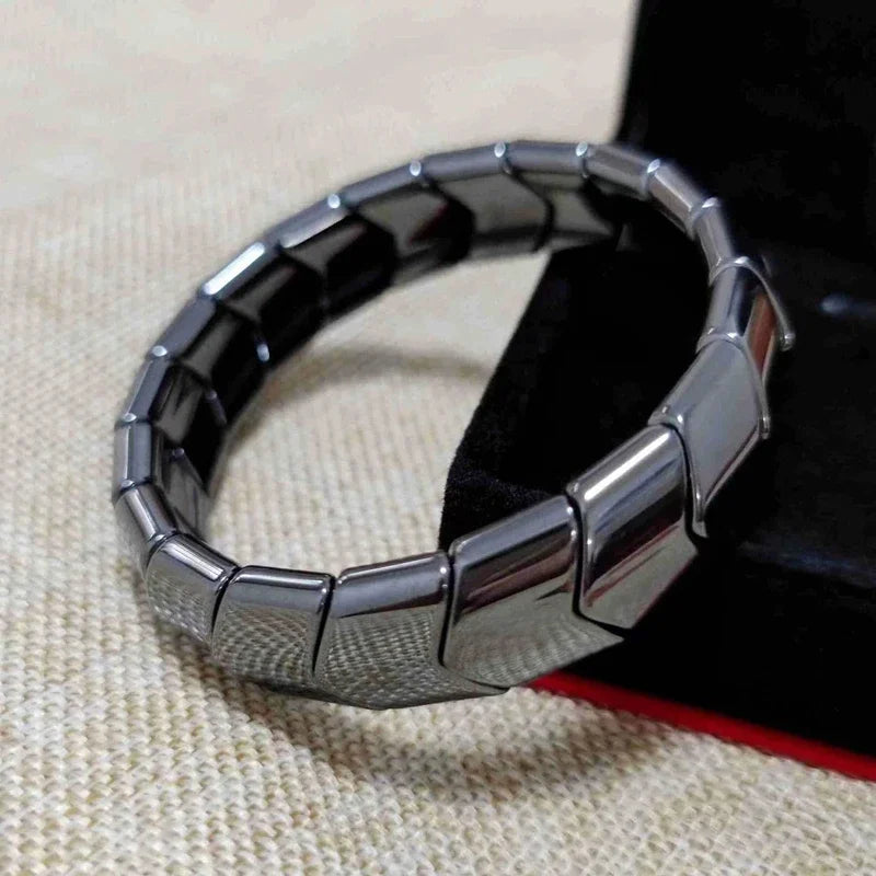 Black and silver bracelet on a textured surface