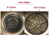 Two decorative metal plates with inner patterns and measurements indicated.