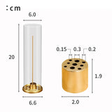 Measurement chart of a cylindrical incense burner with clear glass cover and gold base.