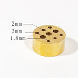 Yellow cylindrical object with holes of different sizes labeled on a white background
