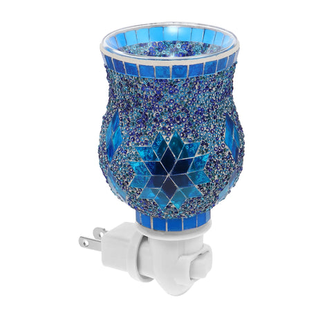 Blue mosaic night light with star design on a white background