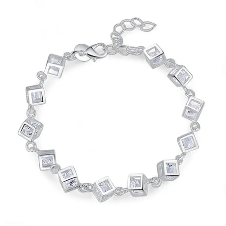 Silver bracelet with square links and embedded crystals on a white background