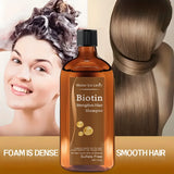 Biotin shampoo bottle with a woman washing her hair and smooth hair on a beige background