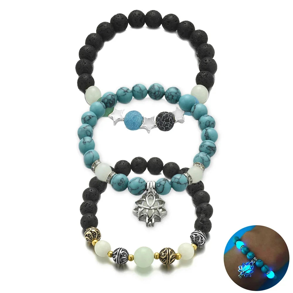 Set of beaded bracelets with decorative elements on a white background