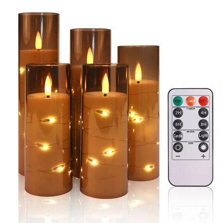 Set of five brown cylindrical LED candles with a remote control on a white background