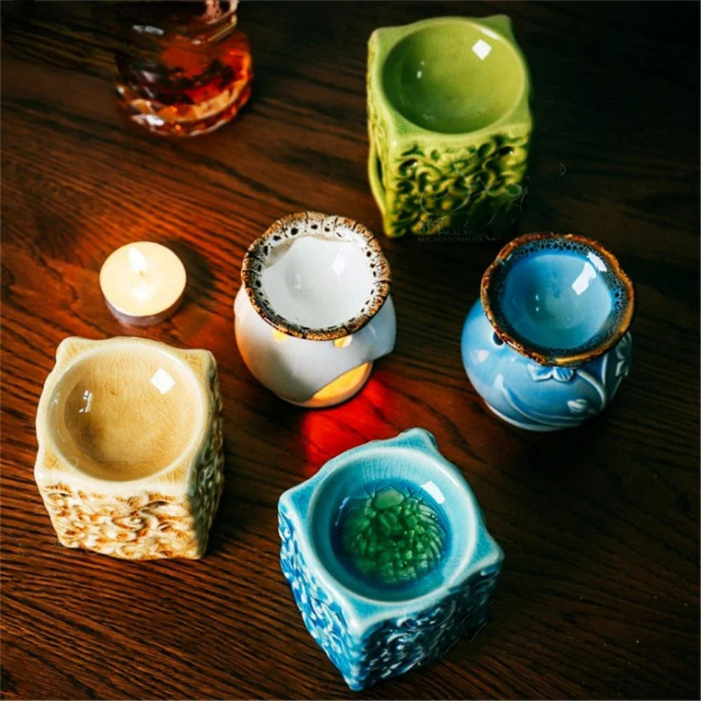 Set of colorful ceramic pots on a wooden surface