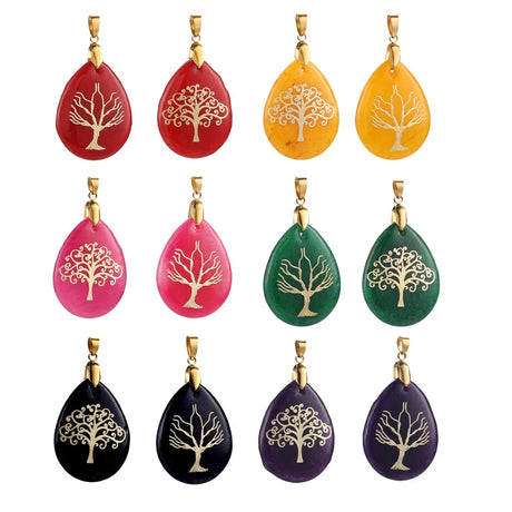 Set of colorful teardrop-shaped pendants with tree designs on a white background