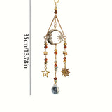 Decorative hanging ornament with celestial elements on a white background