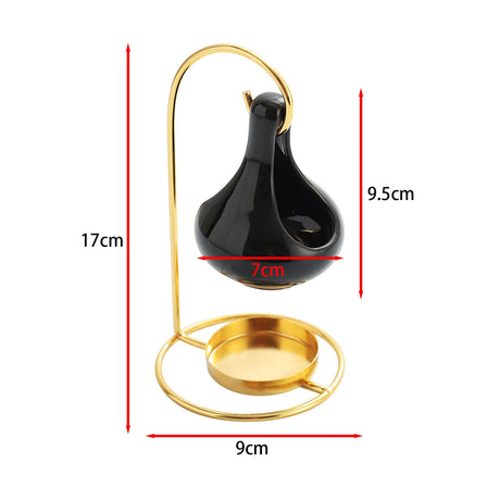 Black ceramic vase with gold stand and measurements on a white background