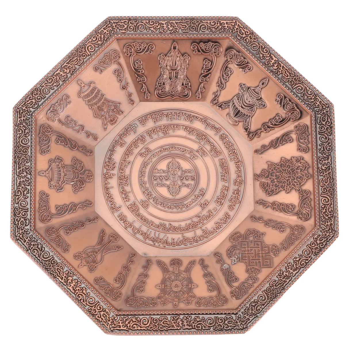Decorative metal plate with intricate designs on a white background