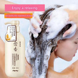Person washing hair with a bottle of shampoo labeled 'Enjoy a relaxing spa-quality hair experience at home'.