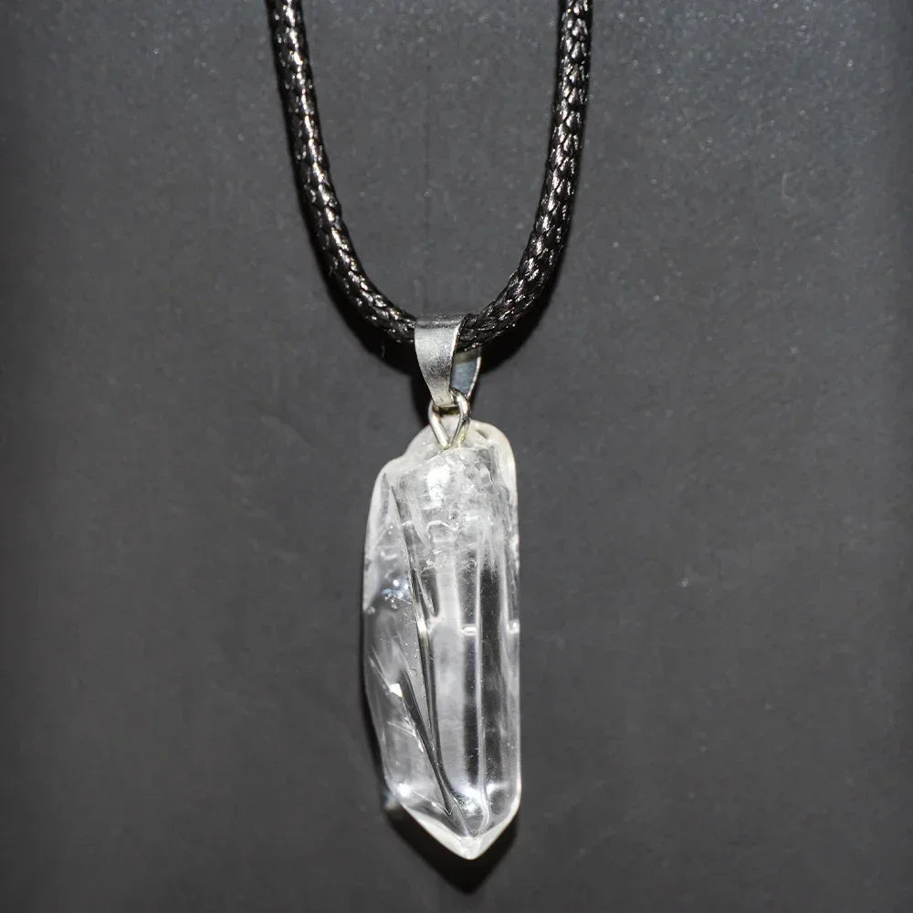 Crystal pendant necklace on a dark background