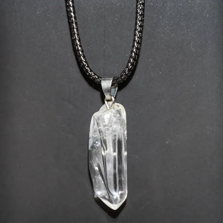 Crystal pendant necklace on a dark background
