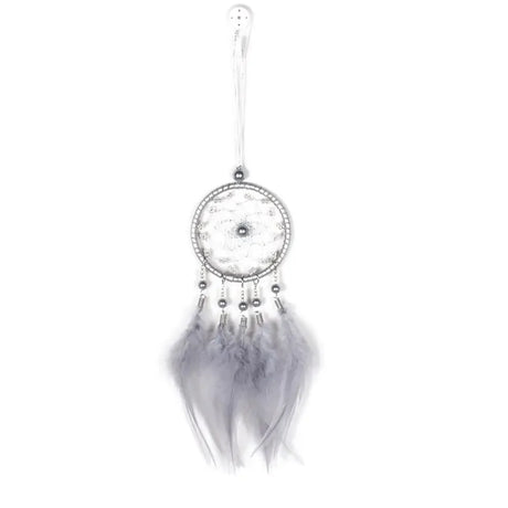 Dreamcatcher with feathers on a white background