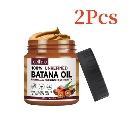 Jar of 100% Unrefined Batana Oil with a black applicator on a white background