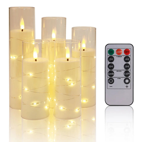 Set of six LED candles with remote control on a white background