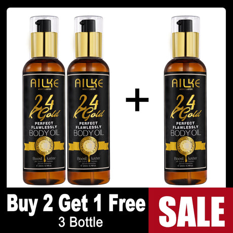 Three bottles of Ailke 24 Gold body oil with a buy two get one free offer on a white background.