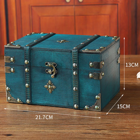 Blue wooden treasure chest with measurements on a wooden surface