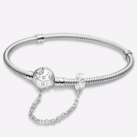 Silver bracelet with a heart-shaped clasp on a white background