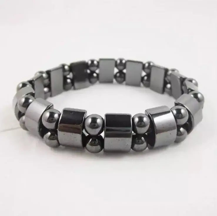 Silver beaded bracelet on a white background