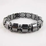 Silver beaded bracelet on a white background