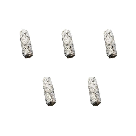 Five white incense sticks on a white background