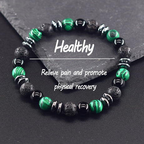 Beaded bracelet with green and black beads on a dark surface, labeled 'Healthy' and 'Relieve pain and promote physical recovery'.