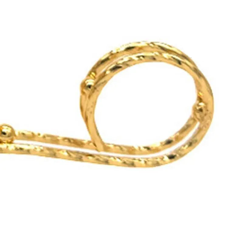 Gold bracelet on a white background with a discount tag icon.
