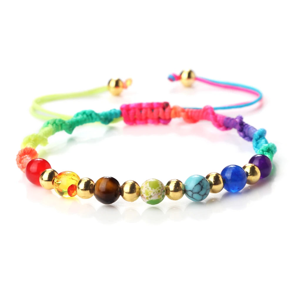 Colorful beaded bracelet with various beads on a white background
