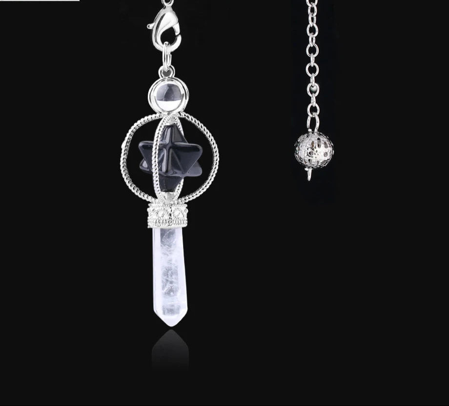 Jewelry set with a star-shaped pendant and clear crystal on a black background, featuring the Cilla Jewelry logo.