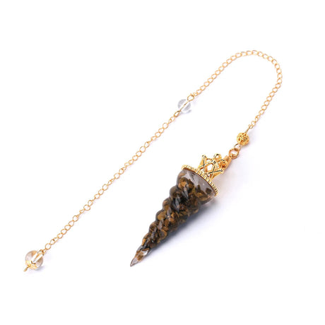 Crystal pendulum with gold chain on a white background