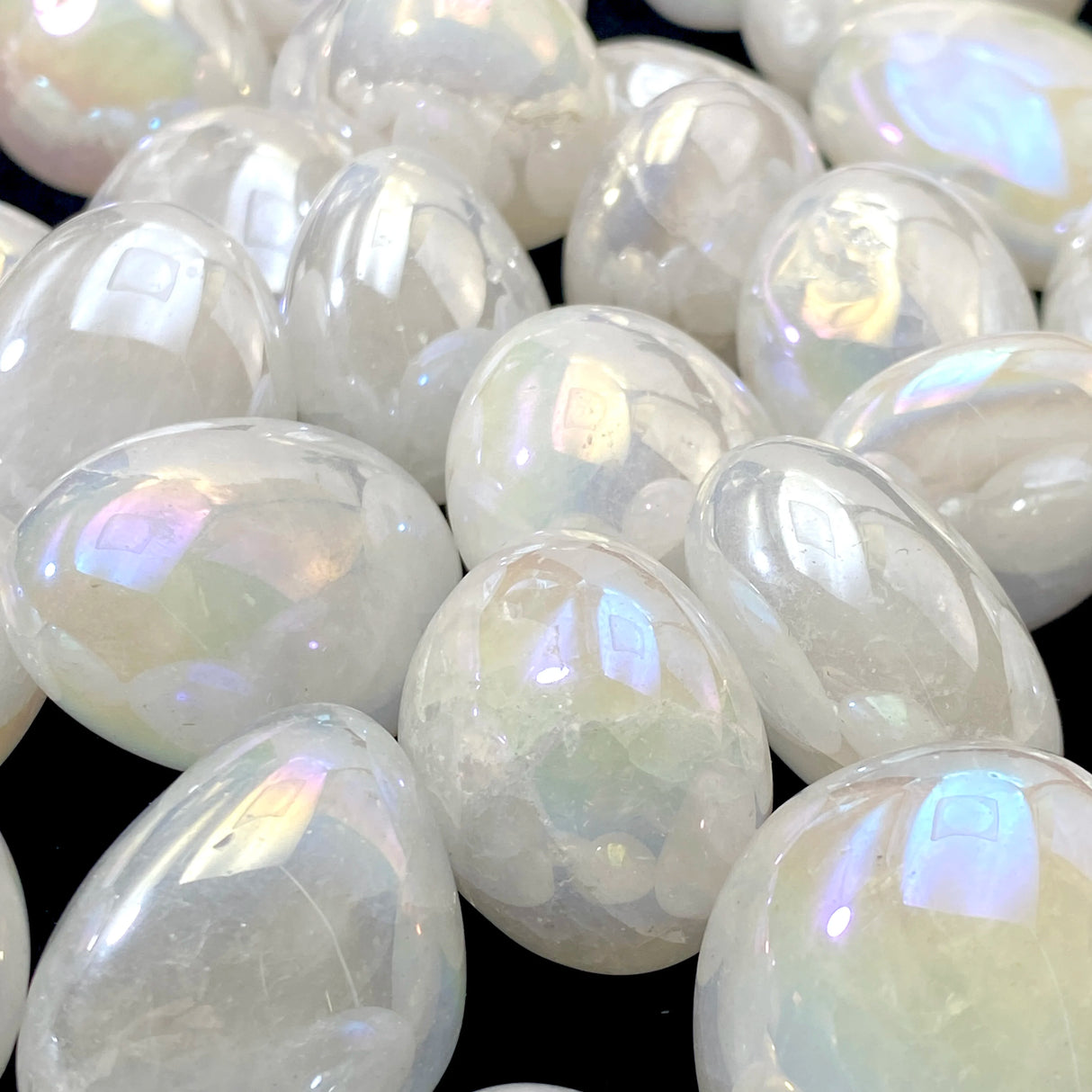 Opalite stones with a glossy finish on a black background