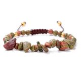 Beaded bracelet with natural stone beads on a white background