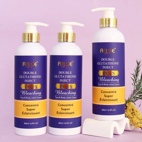 Three bottles of AILYE Double Glutathione Inject Plus Bleaching Face & Body Lotion Cream on a pink background.