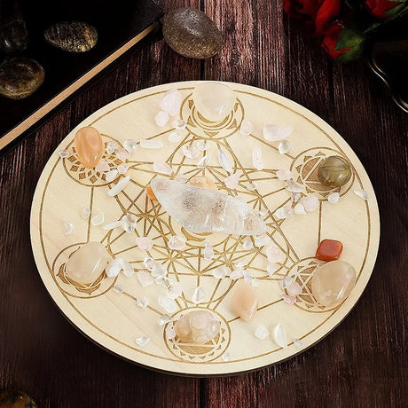 Crystal grid with stones on a wooden surface