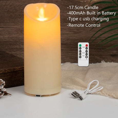 Flickering candle light with remote control and USB cable on a wooden background