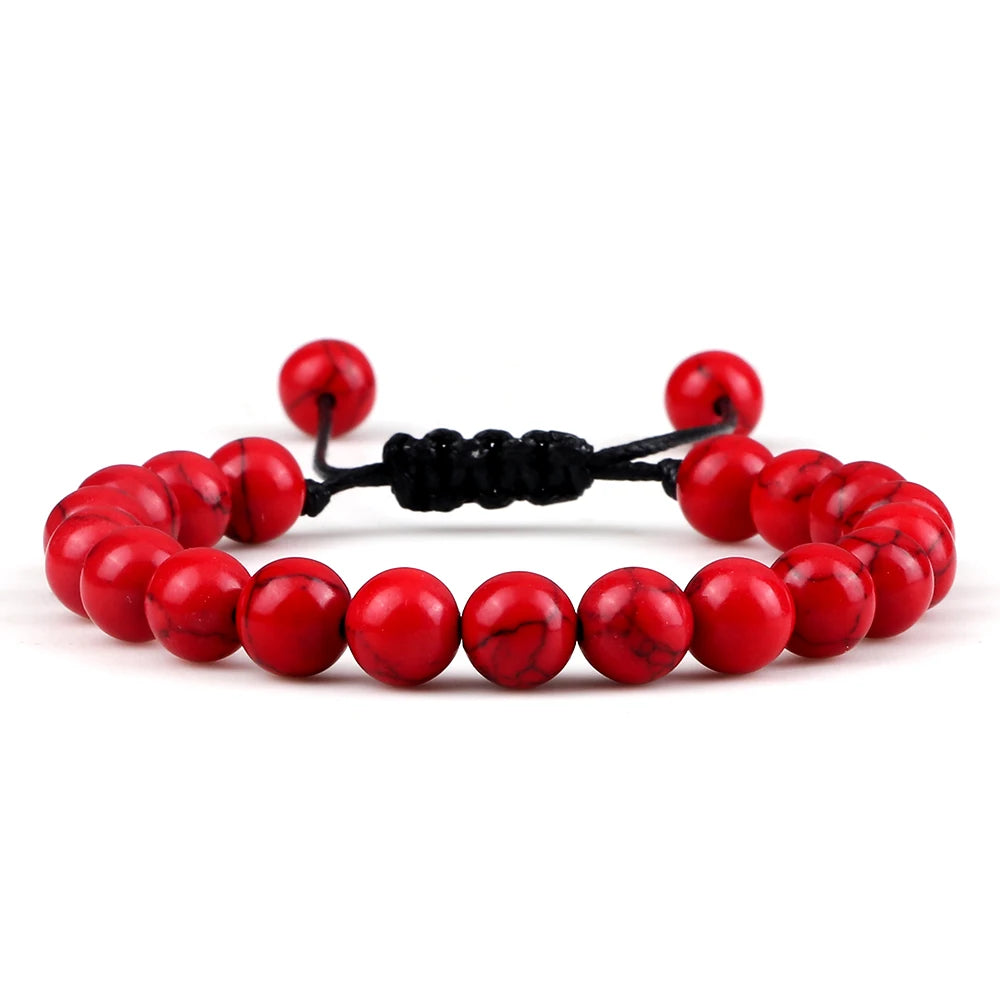 Red beaded bracelet on a white background