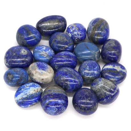 Collection of blue and gray stones on a white background