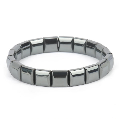 Silver bracelet with square links on a white background