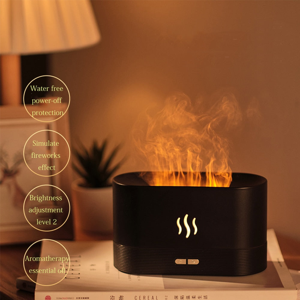 Black flame-shaped diffuser emitting flames on a table with decorative elements in the background.