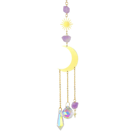 Decorative hanging with sun, moon, and crystal elements on a white background
