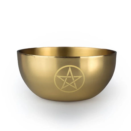 Gold bowl with pentagram design on a white background
