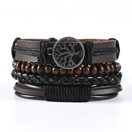 Multistrand leather and wood bracelet with tree of life charm on a white background