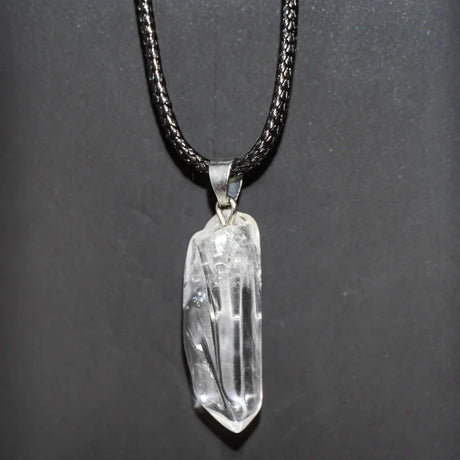 Crystal pendant necklace on a dark background
