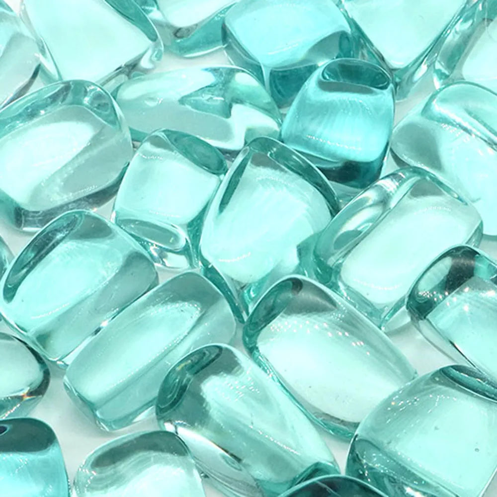 Turquoise glass beads on a white background