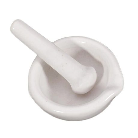 White ceramic mortar and pestle on a white background