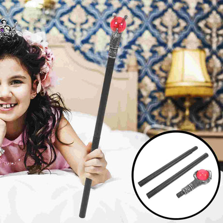 Young girl holding a magic wand with a red gem, wearing a tiara, in a room with decorative wallpaper.